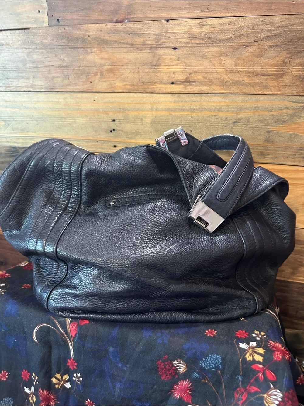 B Makowsky- large black slouchy bag. 100% leather with silver buckles.